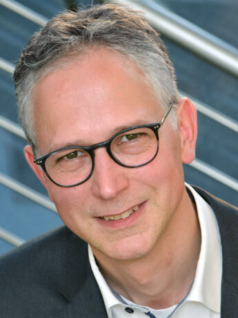 Porträtaufnahme von Dr. Hendrik Schellmann