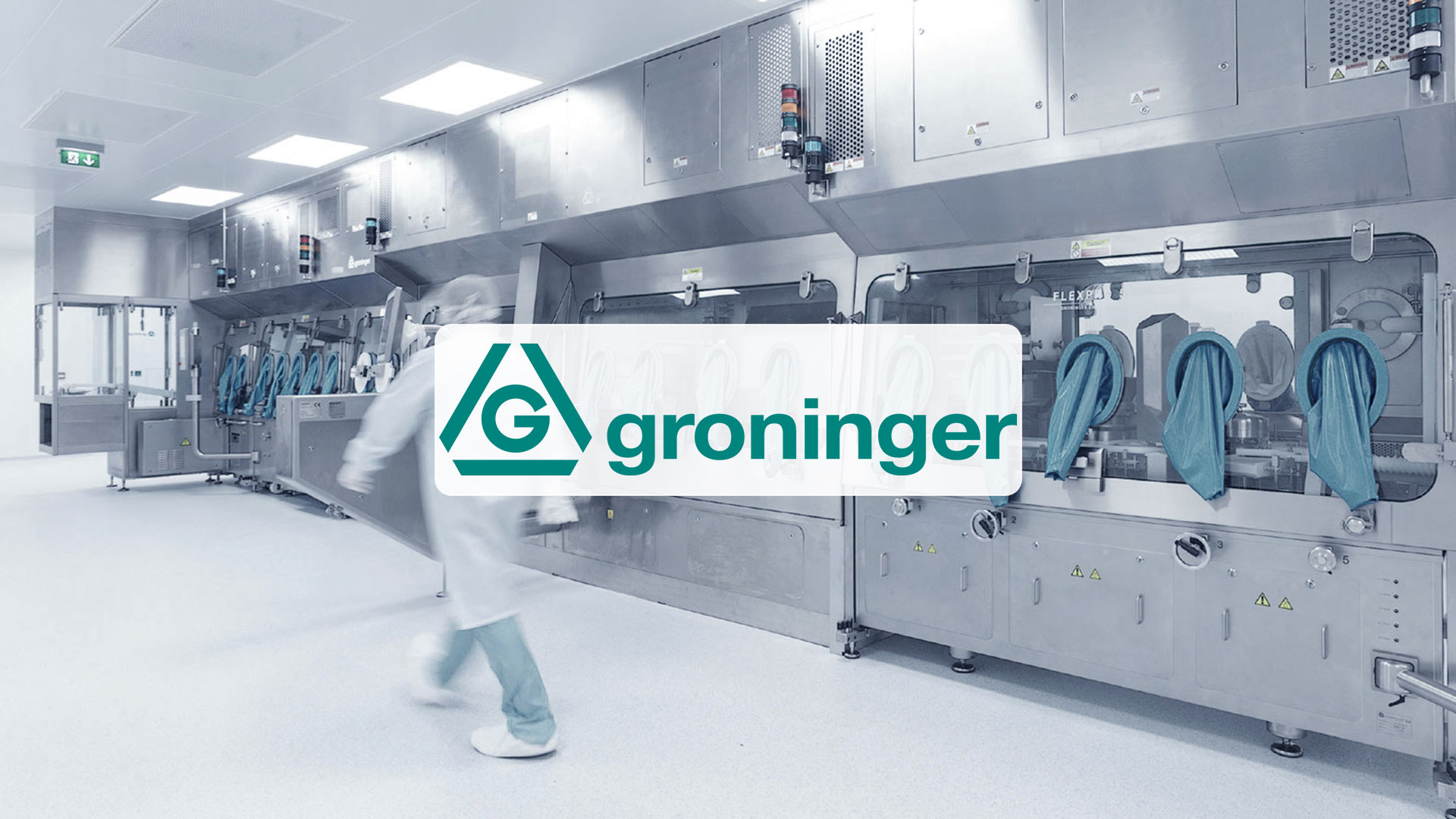 Maschine mit Handschuhen an Bedienöffnungen und dem Schriftzug 'groninger' in einem weißen Rechteck