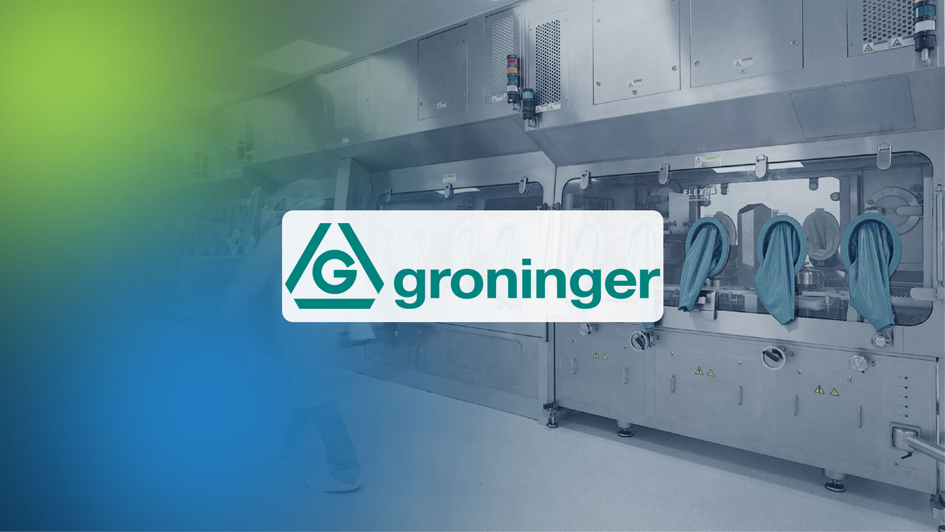 Maschine mit Handschuhen an Bedienöffnungen und dem Schriftzug 'groninger' in einem weißen Rechteck